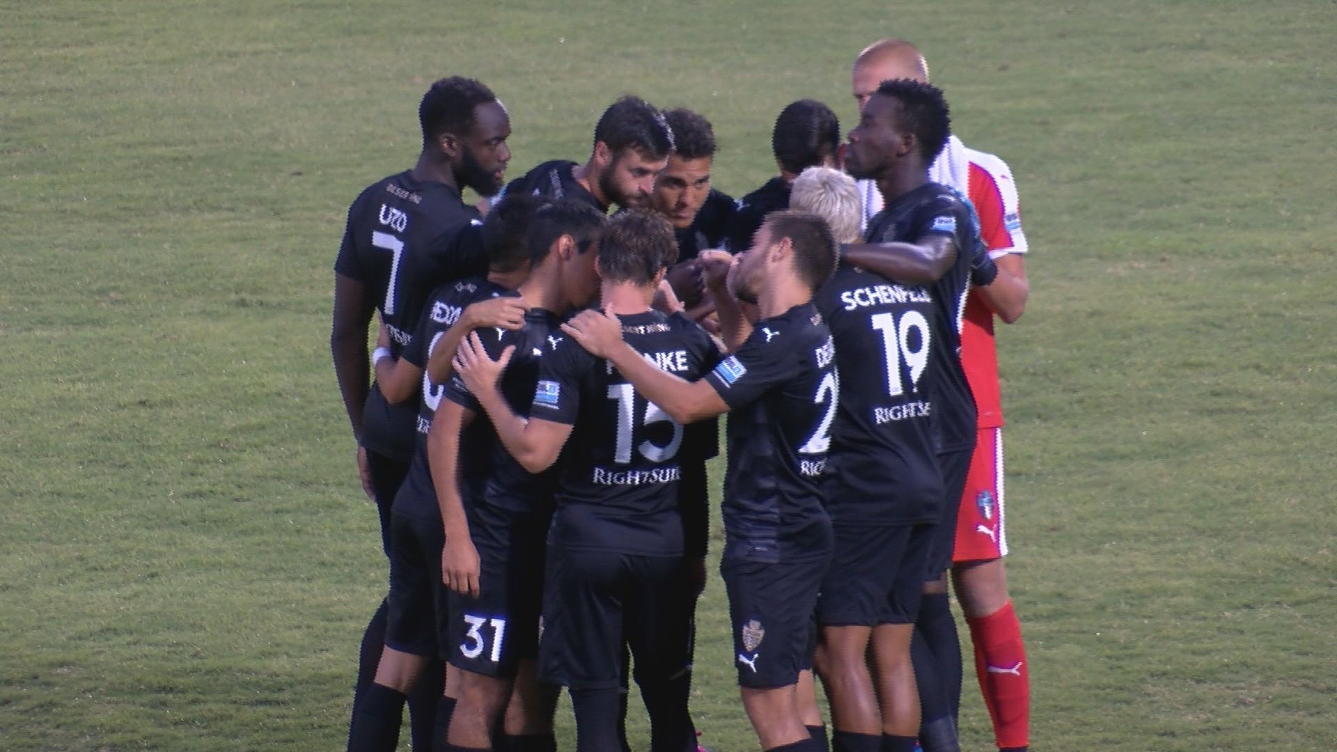 FC Tucson (21) pre-kick huddle